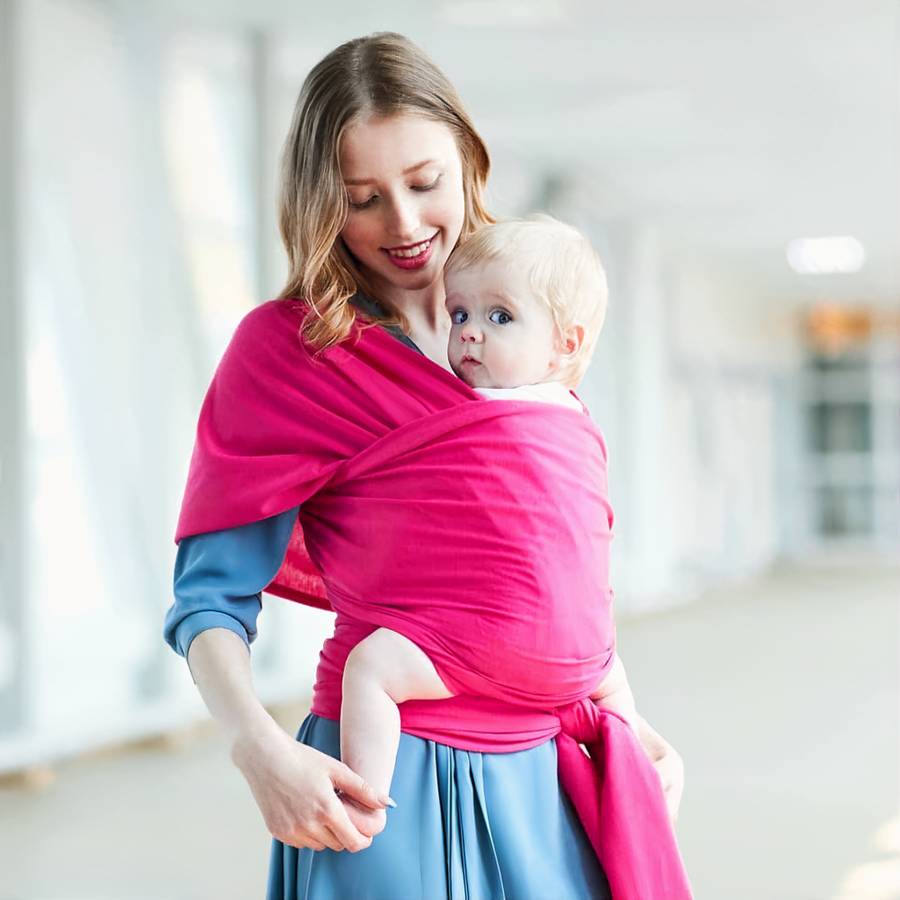 Porte-bébé souple avec pochette de rangement