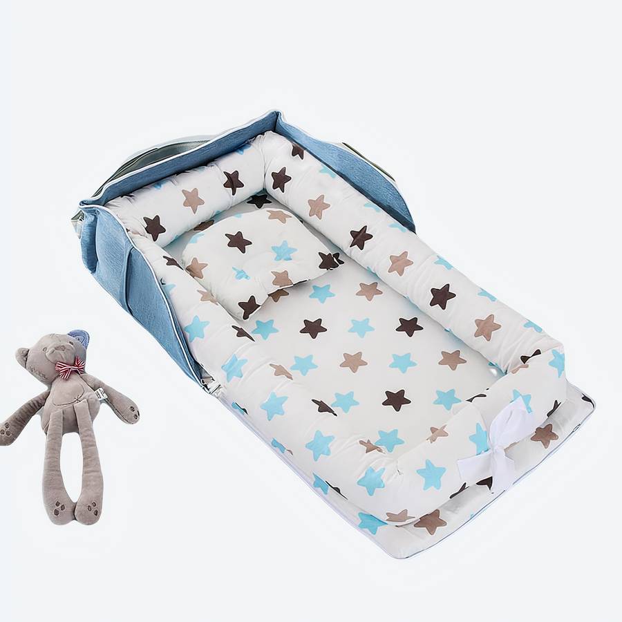 Réducteur de lit bébé pliable bleu avec étoiles