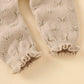 Barboteuse tricotée 100% coton pour bébé