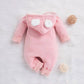 Grenouillère à capuche pour bébé