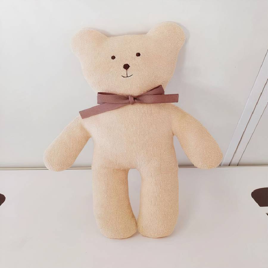 Mignon ourson en peluche pour bébé